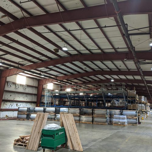 A shipping warehouse being lit with LED lighting