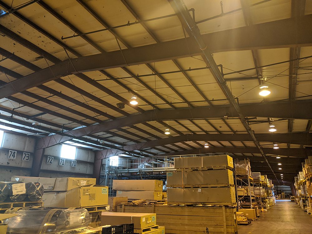 A dimly lit shipping warehouse
